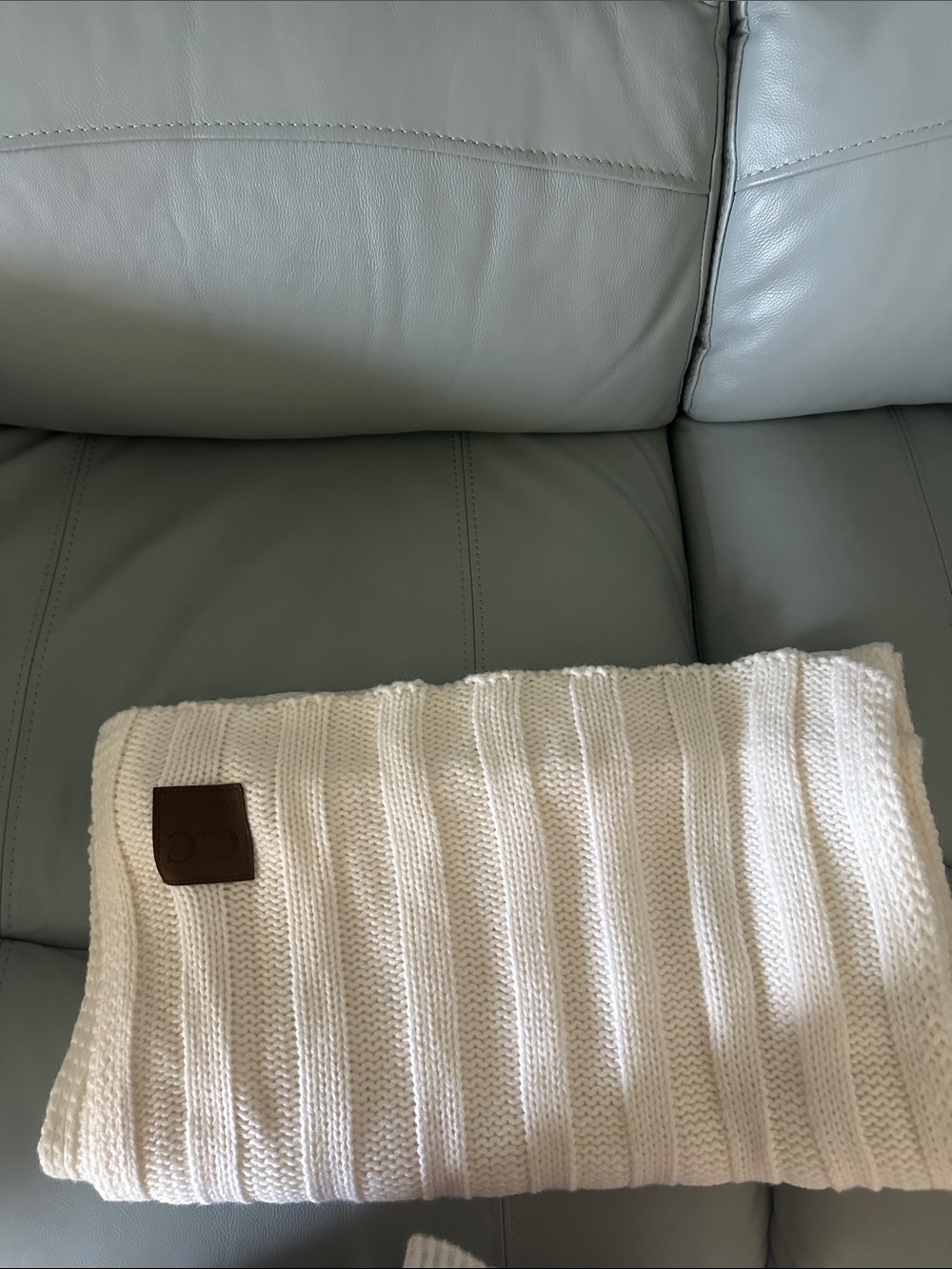 CCM Cream Knit Throw with Brown Leather Patch